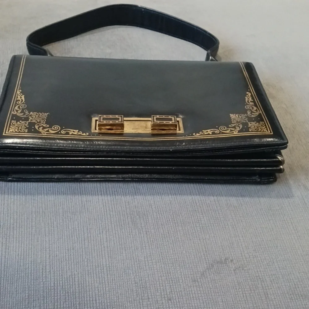 Black Shoulder Bag with Gold Accents